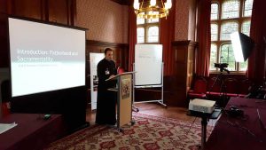 Picture of Father Dragos Herescu lecturing.